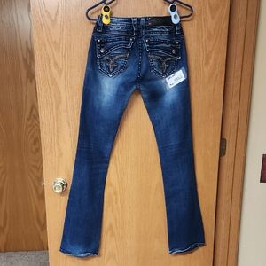Rock revival Women's Blue Jeans 28x32...number 3502..discounted
